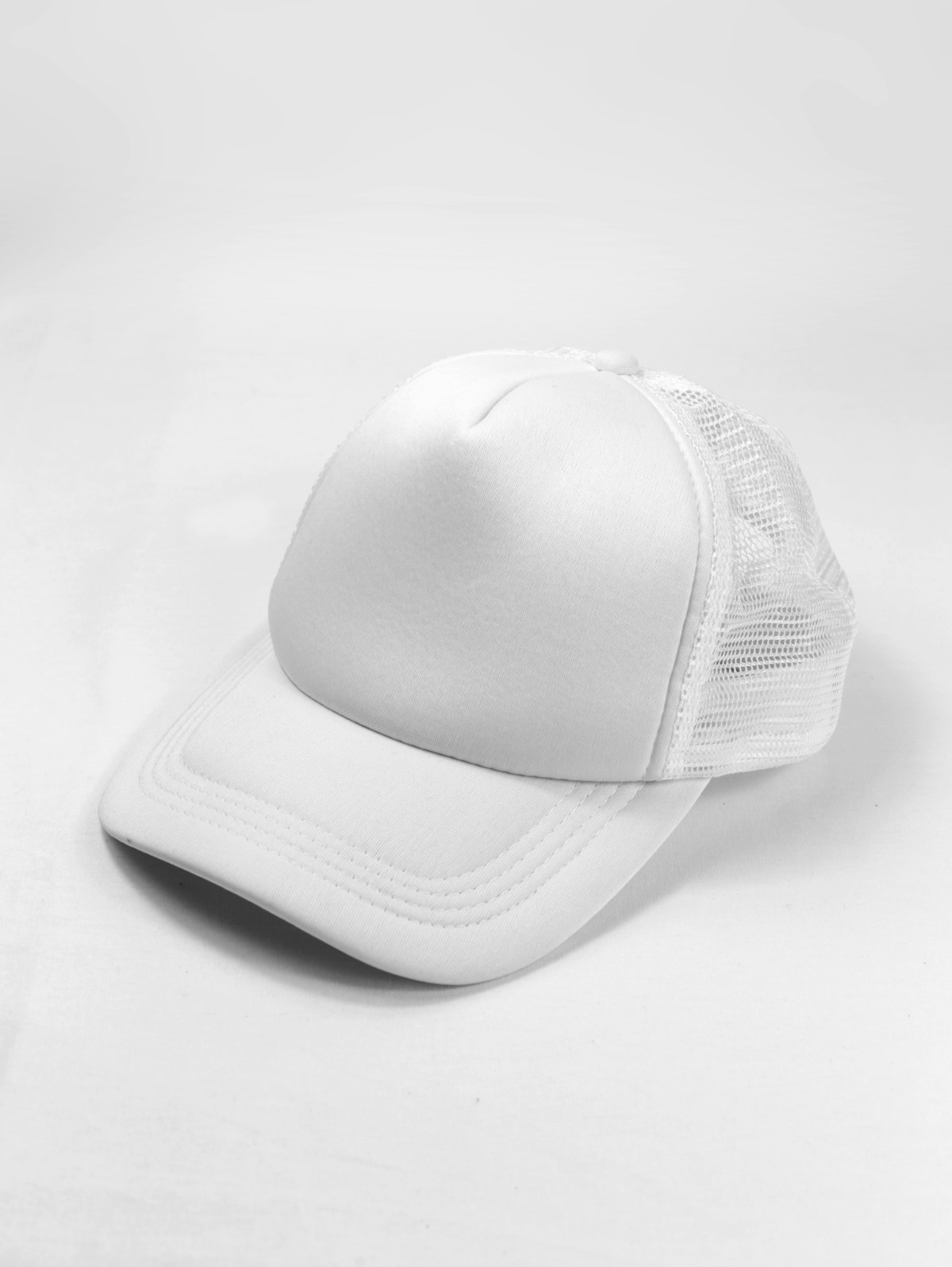 Trucker cap next to a running cap