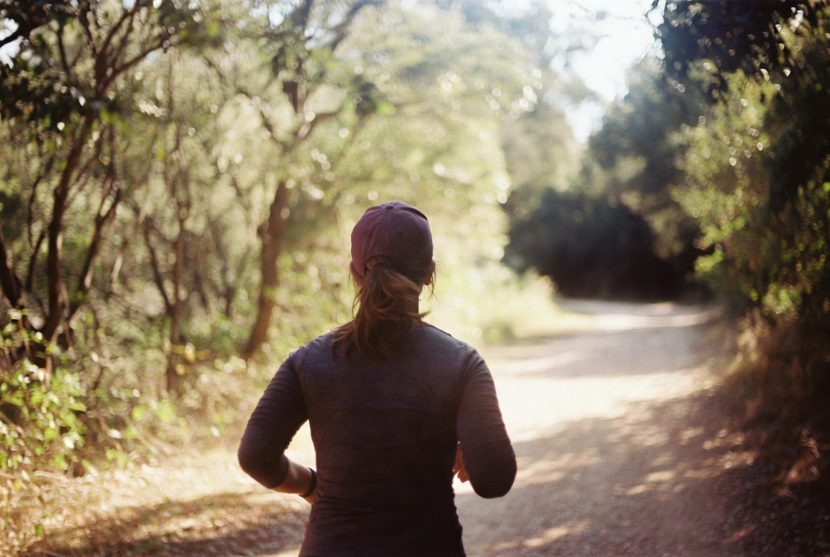 Woman runner wearing cap